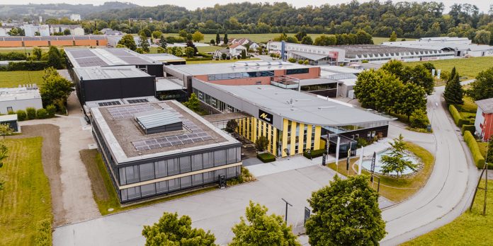 AV Stumpfl celebrates the opening of its new 2,200m² production hall with its entire team during 2025's summer family festival.